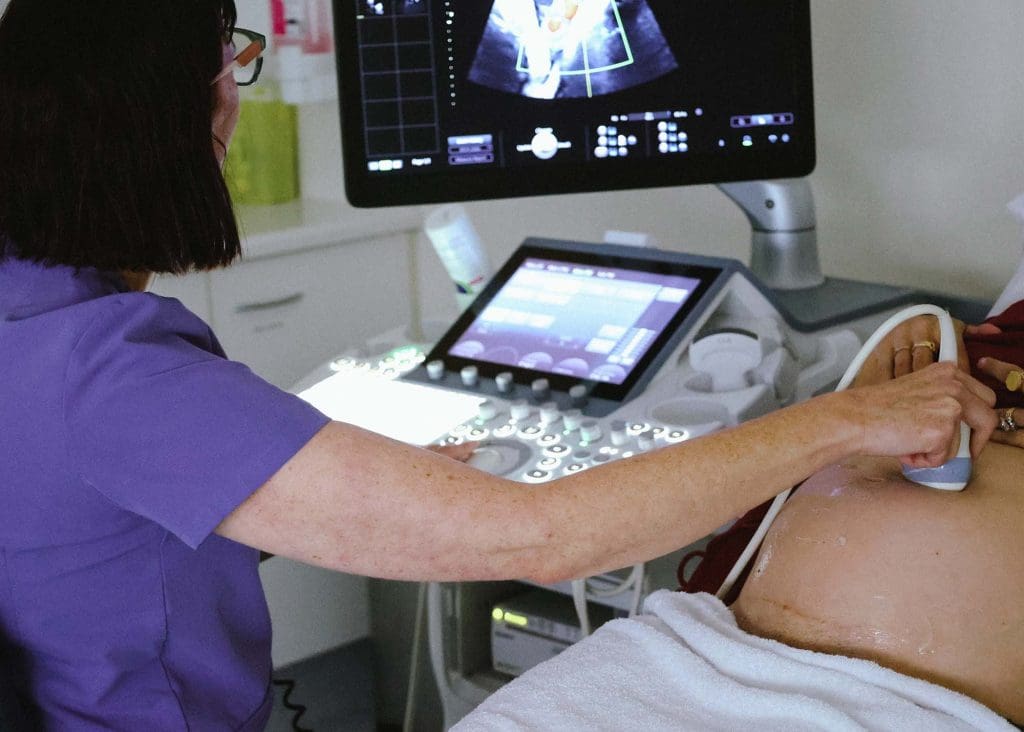 Pregnant woman undergoing routine specialist ultrasound scan at Women’s Health Circle clinic in North Queensland